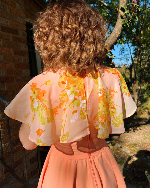 70s peachy floral caped mini dress (S)